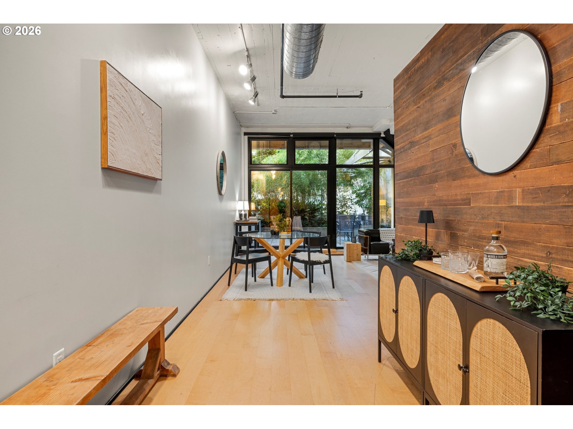 1400 Northwest Irving Street, Unit 322 Portland, OR 97209 - Photo 7 of 27 a view of a room with furniture and a large window