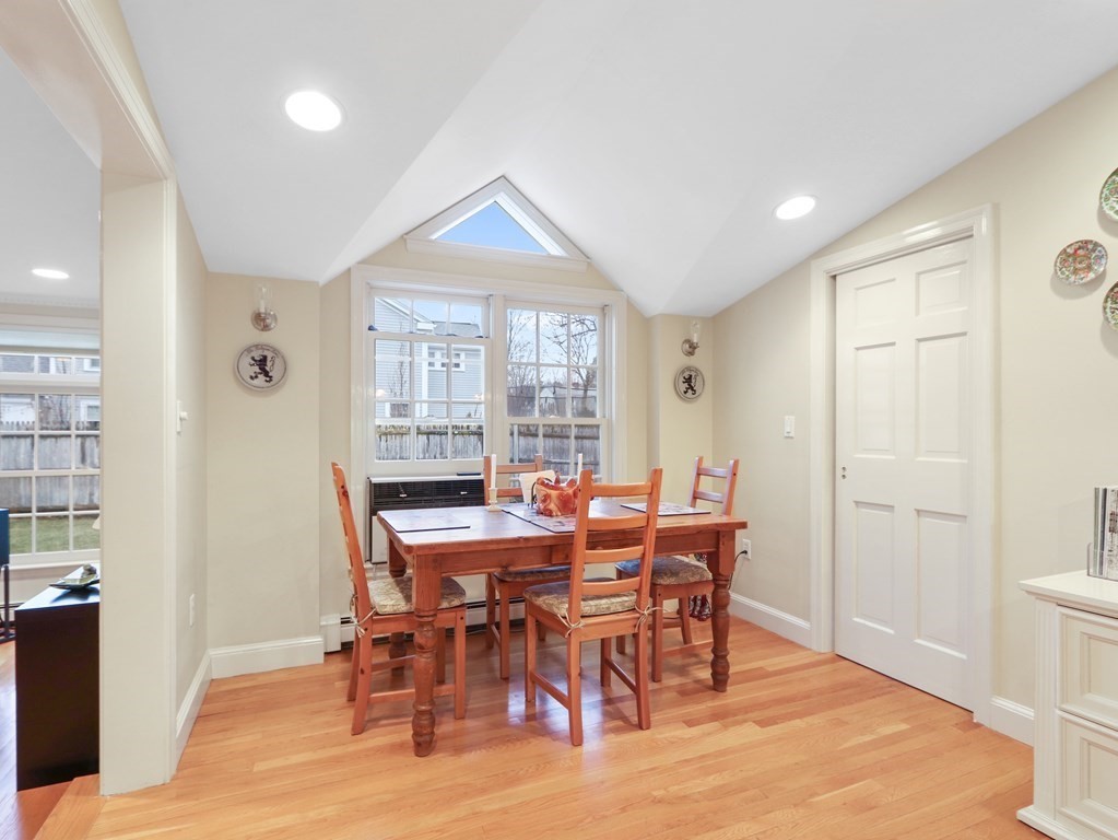 52 Beverly Road Wellesley, MA 02481 - Photo 6 of 41 a view of a dining room with furniture and wooden floor