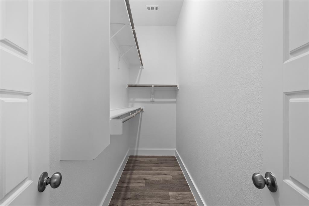 3274 Ganzer Road West, Unit 102B Denton, TX 76207 - Photo 16 of 22 a view of hallway with stairs