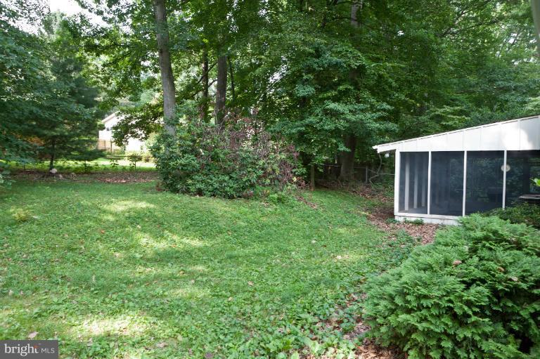 4808 Rim Rock Road Rockville, MD 20853 - Photo 2 of 23 Rear Yard with Screened Porch