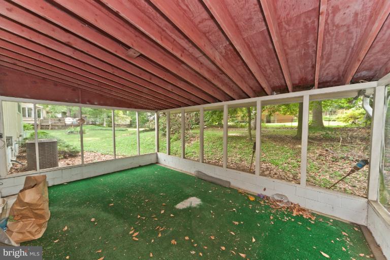 4808 Rim Rock Road Rockville, MD 20853 - Photo 17 of 23 Rear screened in porch
