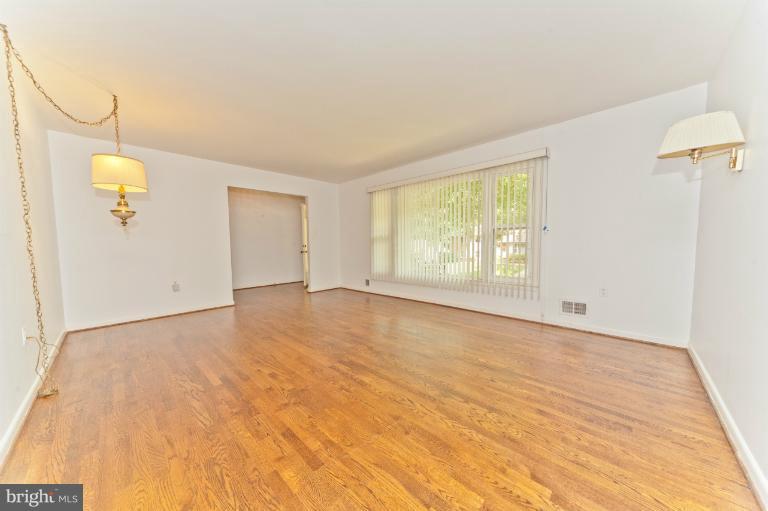 4808 Rim Rock Road Rockville, MD 20853 - Photo 18 of 23 Living Room view from Dining Room