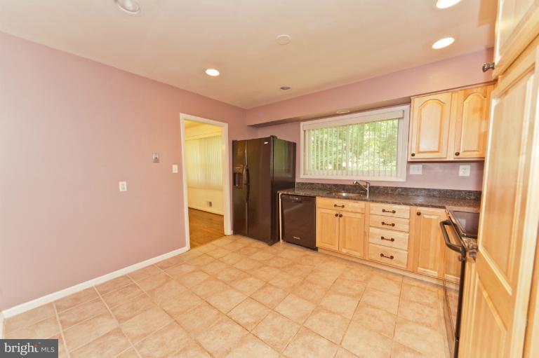 4808 Rim Rock Road Rockville, MD 20853 - Photo 3 of 23 Kitchen view from Foyer