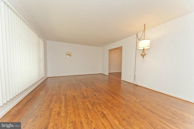 4808 Rim Rock Road Rockville, MD 20853 - Photo 9 of 23 Living Room view from Foyer