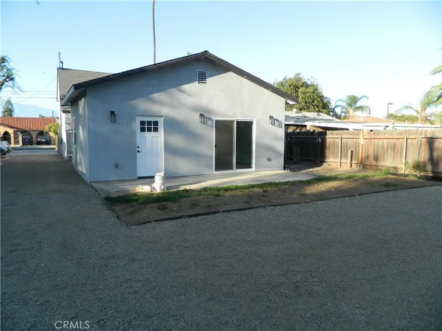 a house view with a garden space