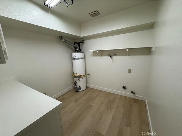 a view of a room with racks on the wall