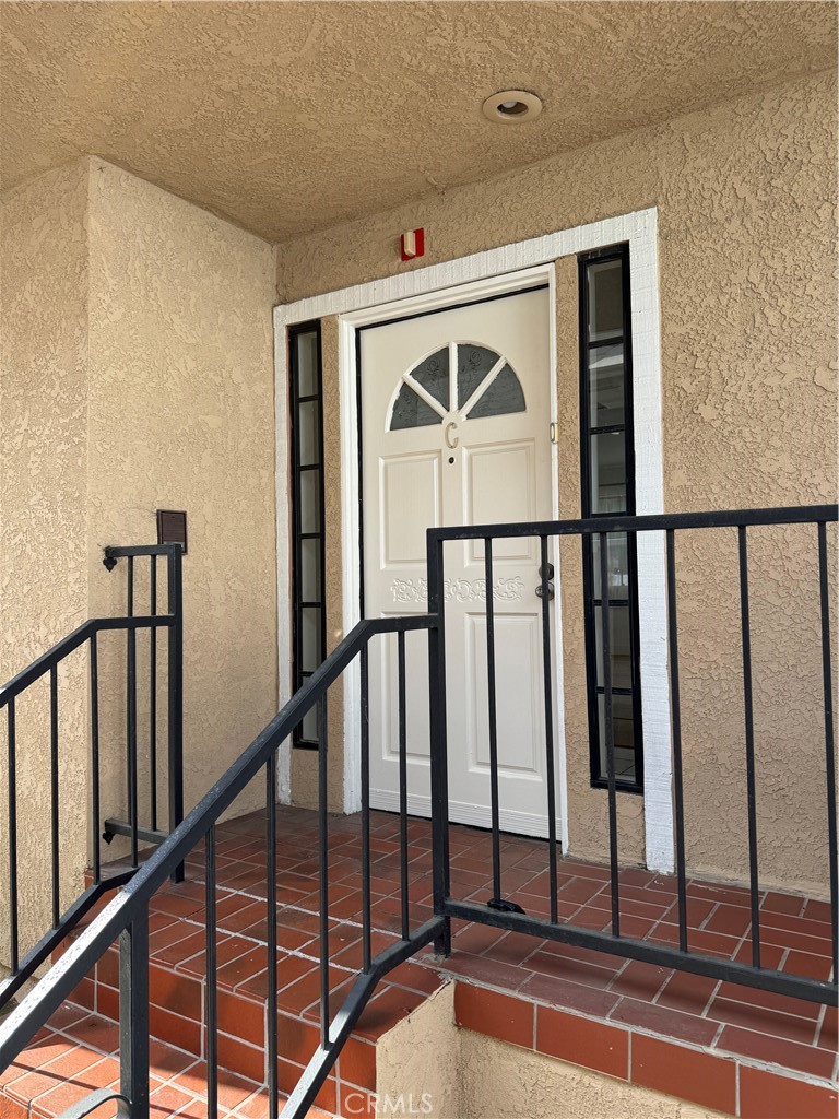 526 South Catalina Avenue, Unit C Redondo Beach, CA 90277 - Photo 23 of 29 a view of staircase with railing and white walls