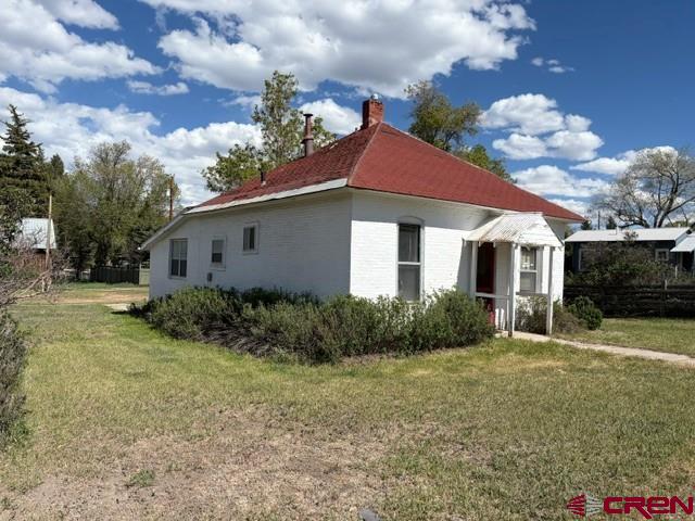 116 South Mary Street Ridgway, CO 81432 - Photo 17 of 23 a view of a house with backyard and garden