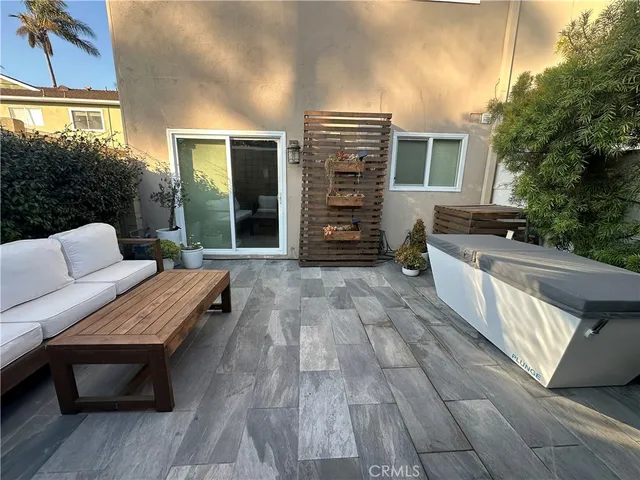 a balcony with furniture and window