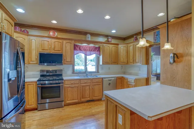 a spacious bedroom with a bed and a couch