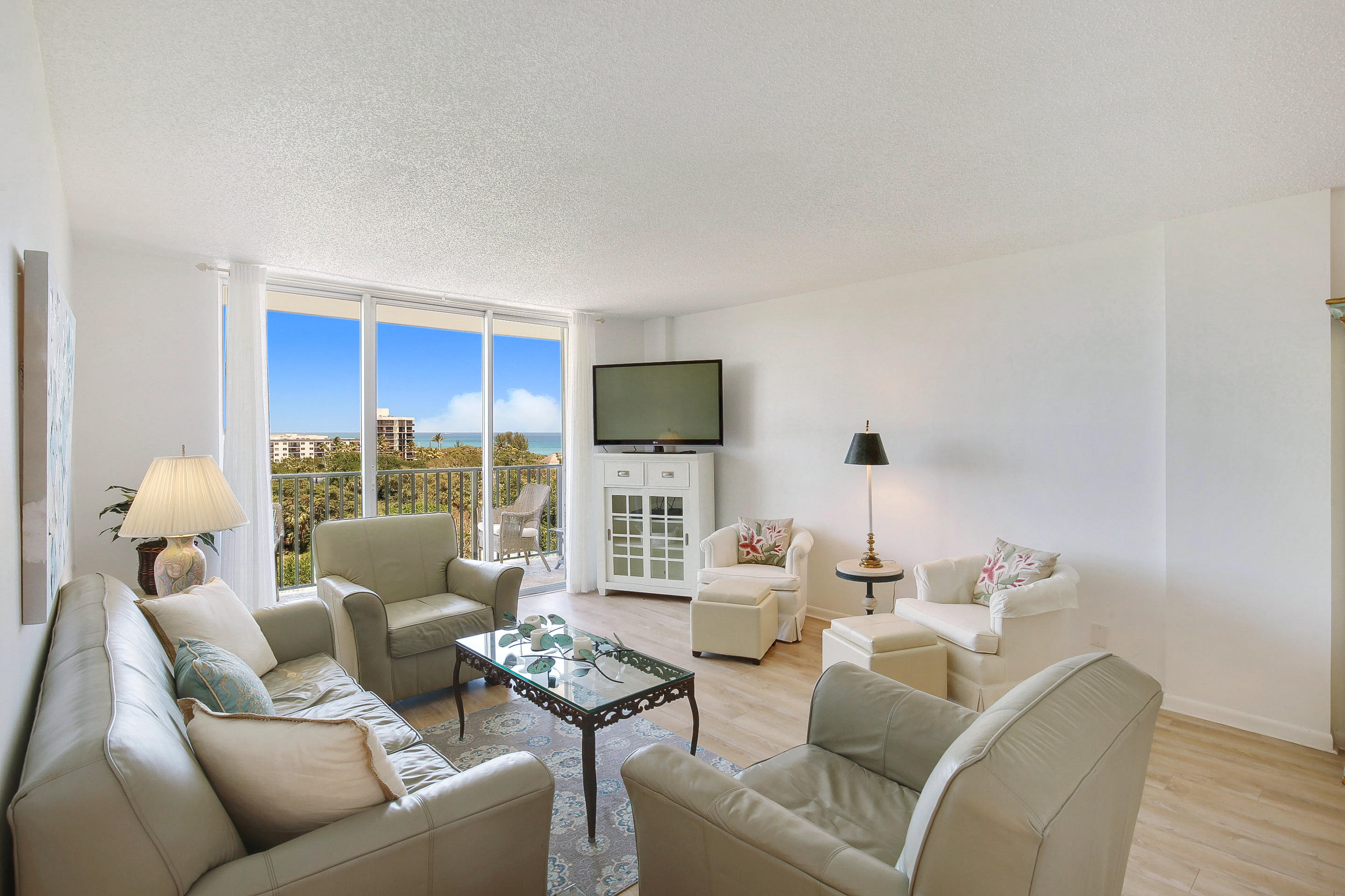 2121 North Ocean Boulevard, Unit 906E Boca Raton, FL 33431 - Photo 4 of 51 LIVING ROOM WITH OCEAN VIEWS