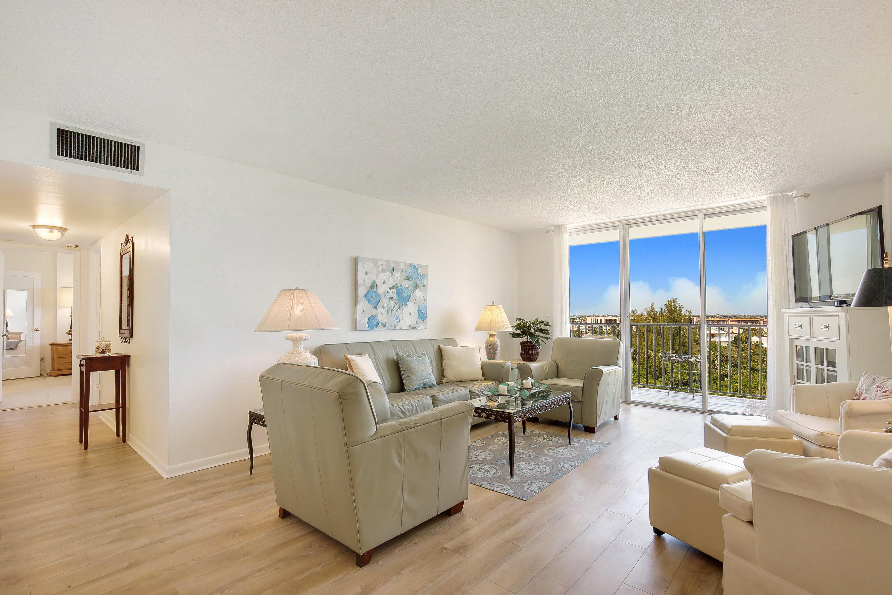 2121 North Ocean Boulevard, Unit 906E Boca Raton, FL 33431 - Photo 5 of 51 LIVING AREA - HALL WAY TO BEDROOMS