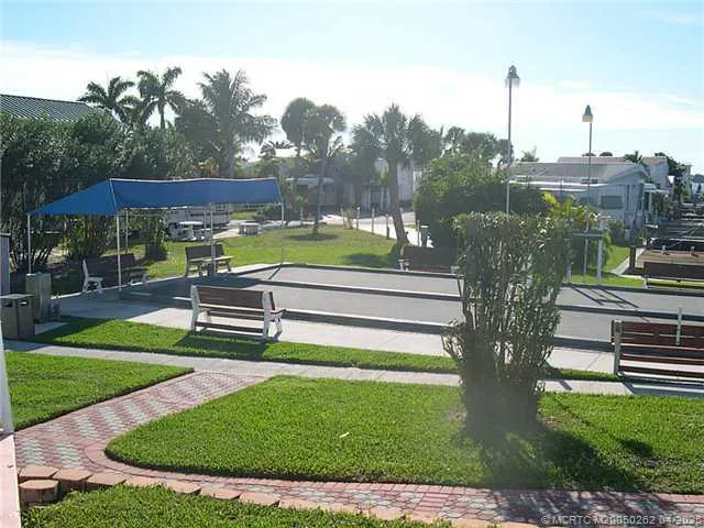 a view of a table and chairs in patio