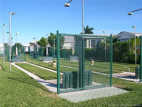 a view of a backyard with plants