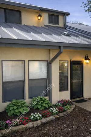 a front view of a house with garden