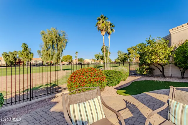 a view of a garden with a patio