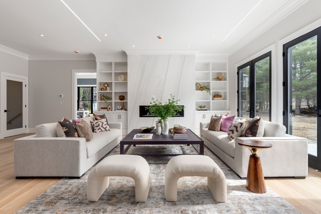211 Stratford Road Needham, MA 02492 - Photo 12 of 32 a living room with furniture and a large window