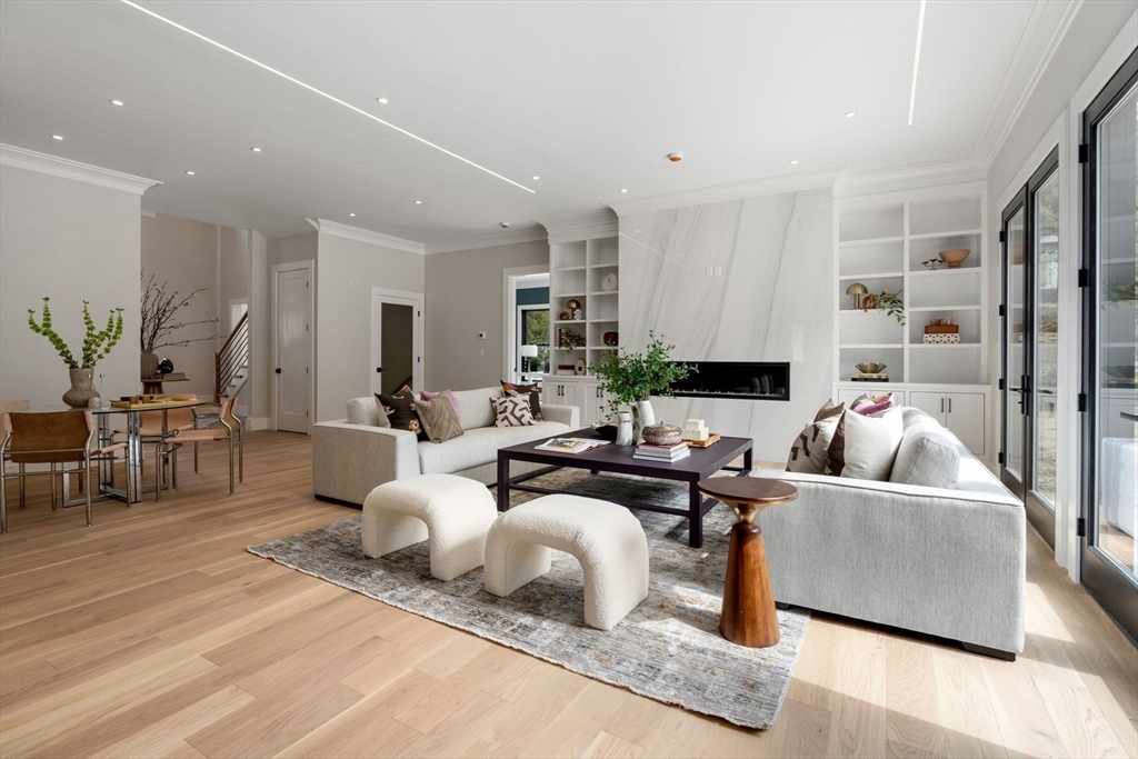 211 Stratford Road Needham, MA 02492 - Photo 13 of 32 a living room with furniture and a large window