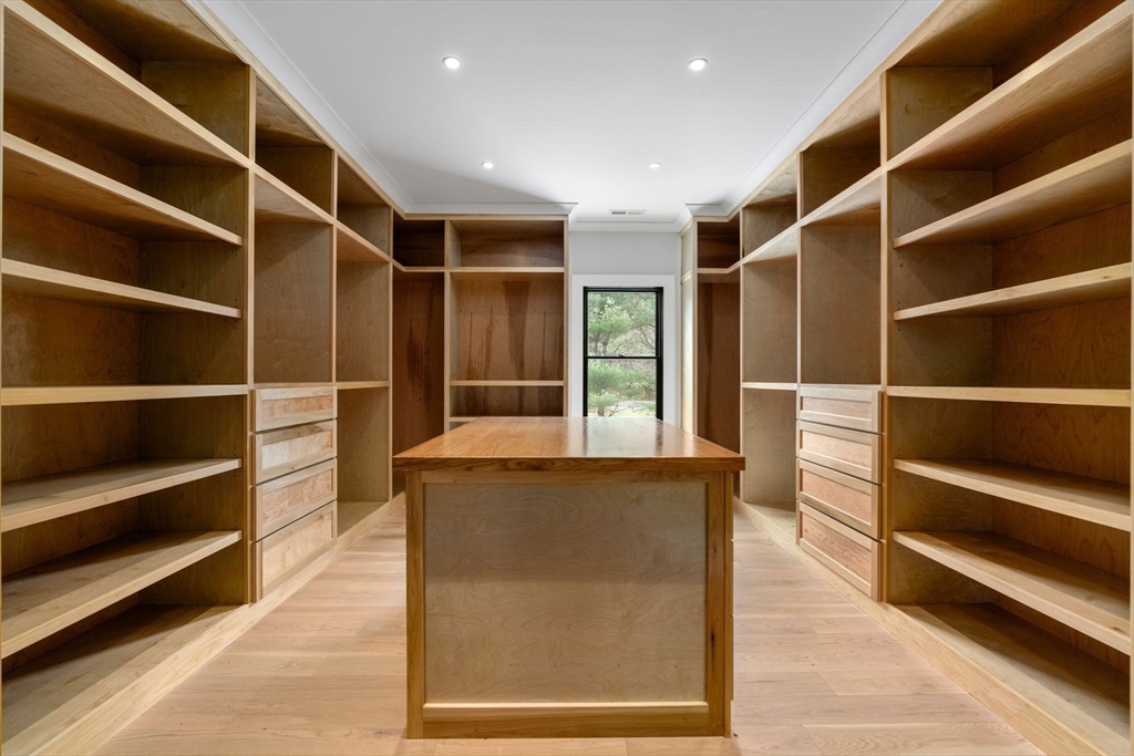 211 Stratford Road Needham, MA 02492 - Photo 21 of 32 a view of walk in closet with empty racks