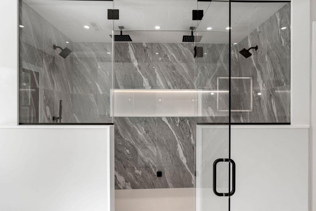 211 Stratford Road Needham, MA 02492 - Photo 24 of 32 a bathroom with a shower