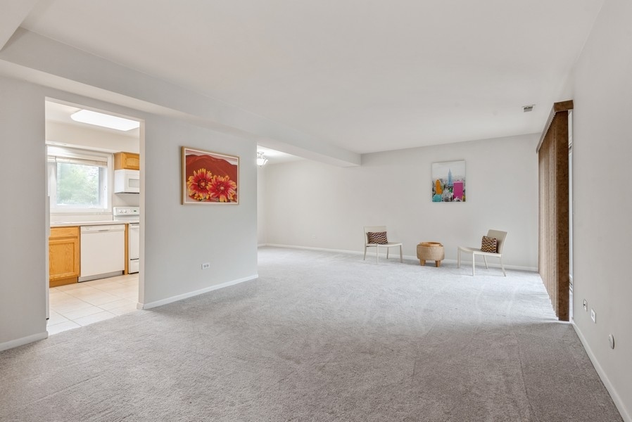 435 Ridge Road, Unit 305 Wilmette, IL 60091 - Photo 3 of 10 a view of an empty room with a window