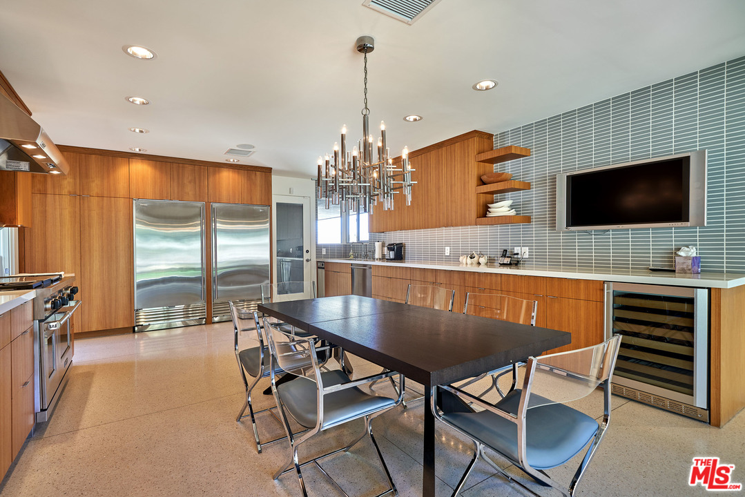 70411 Pecos Road Rancho Mirage, CA 92270 - Photo 11 of 40 a dining room with furniture and window