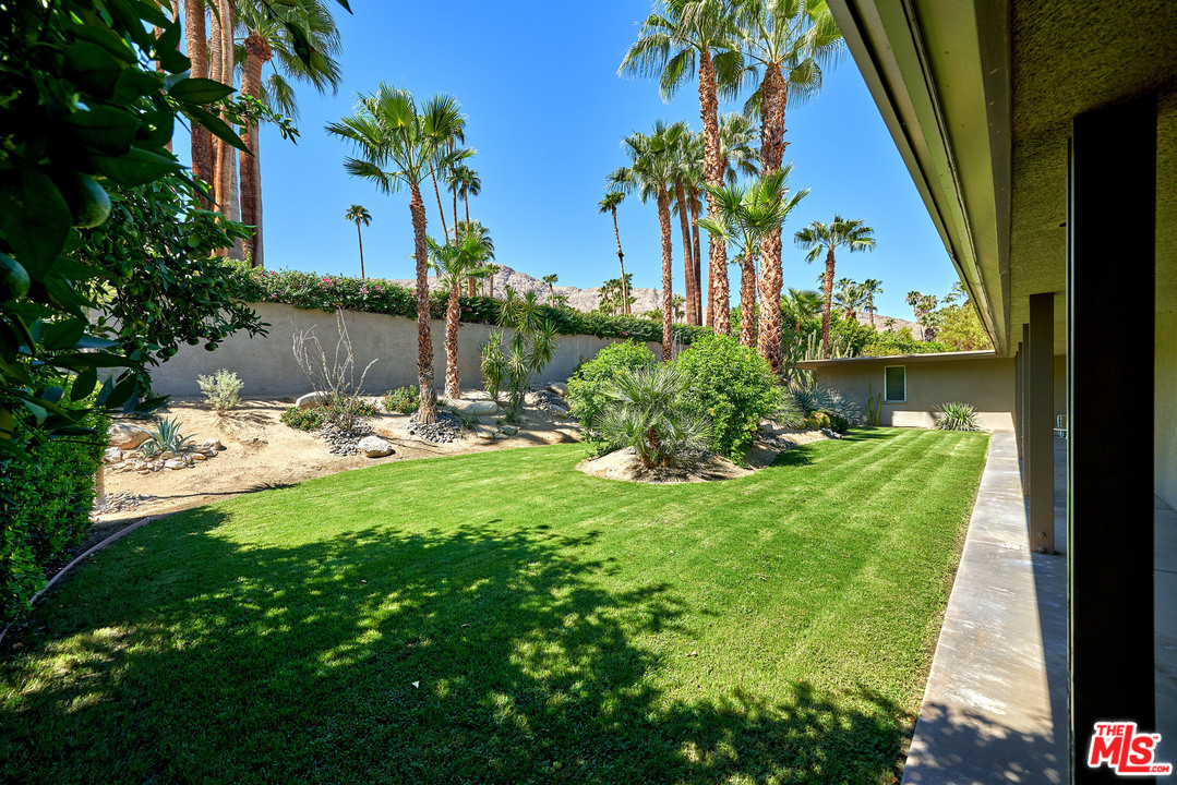 70411 Pecos Road Rancho Mirage, CA 92270 - Photo 18 of 40 a view of a lake from a yard