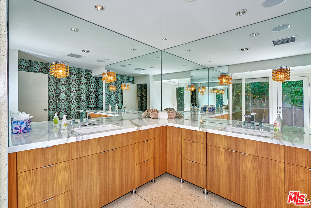 70411 Pecos Road Rancho Mirage, CA 92270 - Photo 27 of 40 a kitchen with sink and view of living room