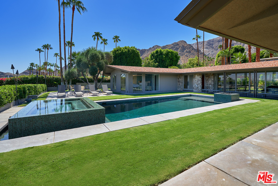 70411 Pecos Road Rancho Mirage, CA 92270 - Photo 30 of 40 a view of house with backyard outdoor seating and hardwood