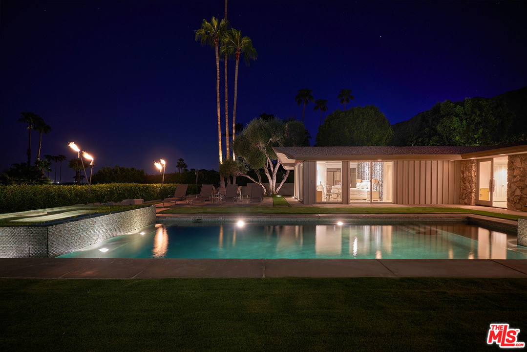 70411 Pecos Road Rancho Mirage, CA 92270 - Photo 38 of 40 a view of a swimming pool with seating space