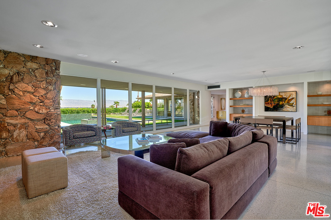 70411 Pecos Road Rancho Mirage, CA 92270 - Photo 5 of 40 a living room with furniture and a floor to ceiling window
