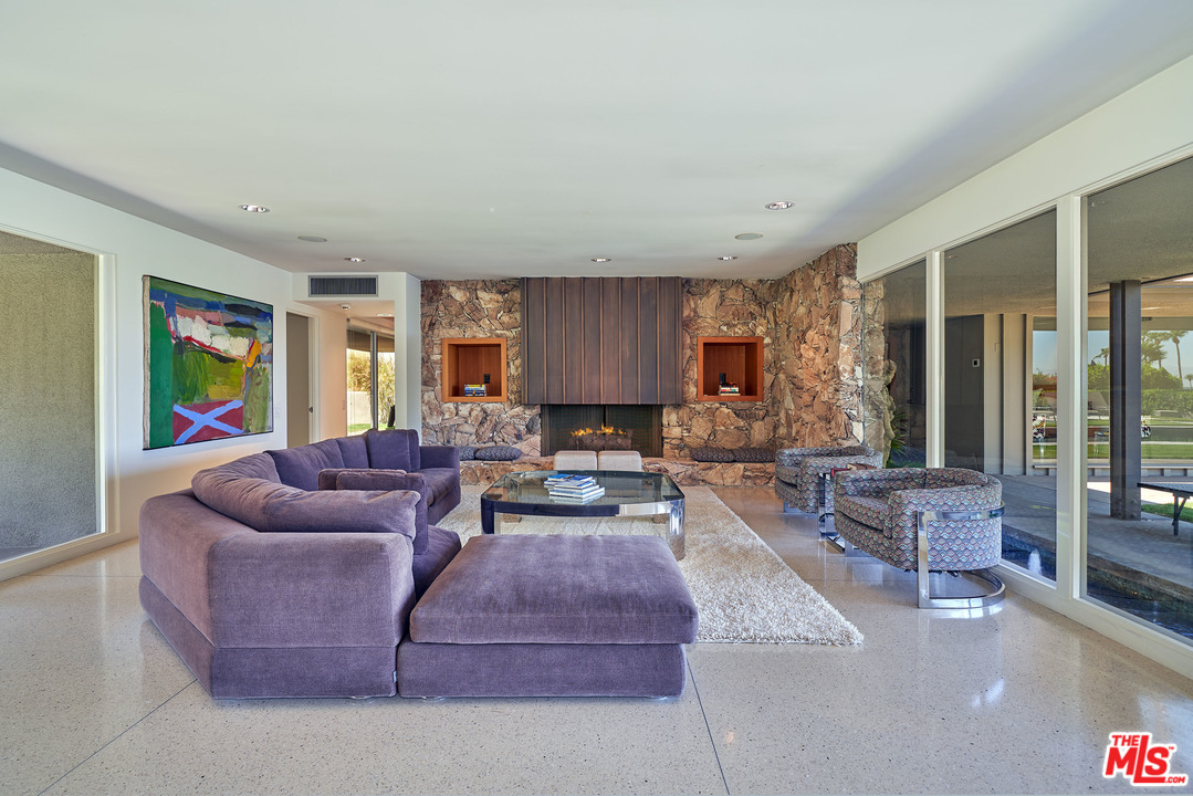 70411 Pecos Road Rancho Mirage, CA 92270 - Photo 7 of 40 a living room with furniture and a large window