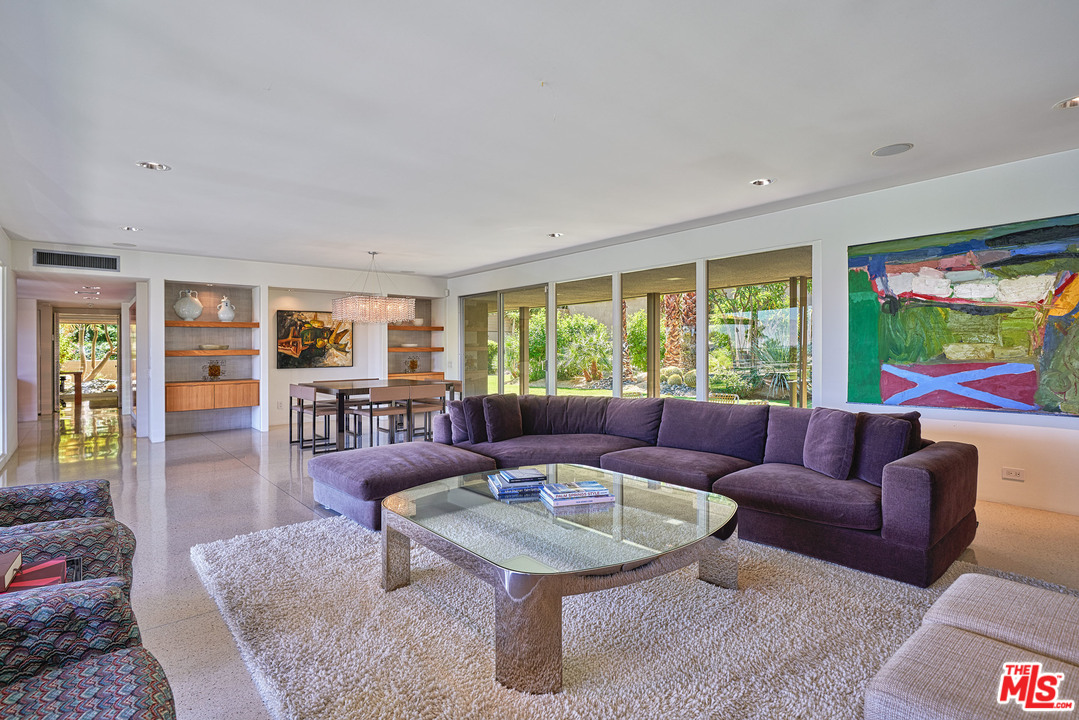 70411 Pecos Road Rancho Mirage, CA 92270 - Photo 8 of 40 a living room with furniture and a large window