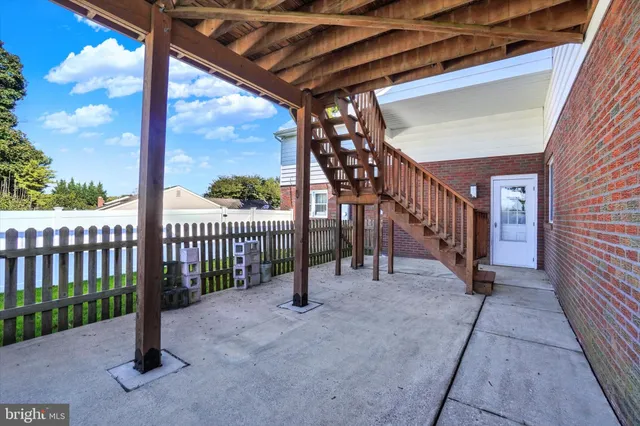 a view of a chairs on the roof deck