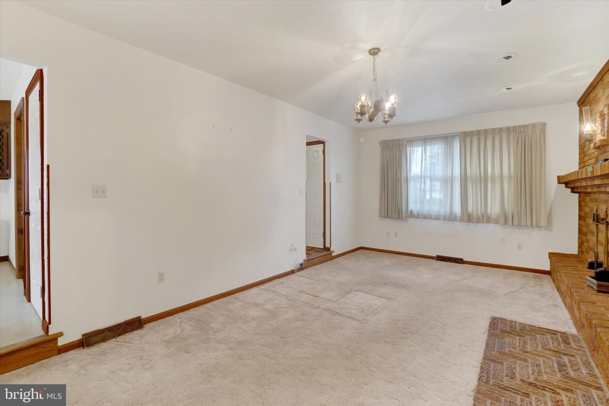 2236 Bob White Lane Lancaster, PA 17601 - Photo 13 of 42 sunken living room with fireplace