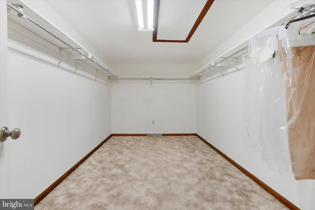 an aerial view of a house with a big yard