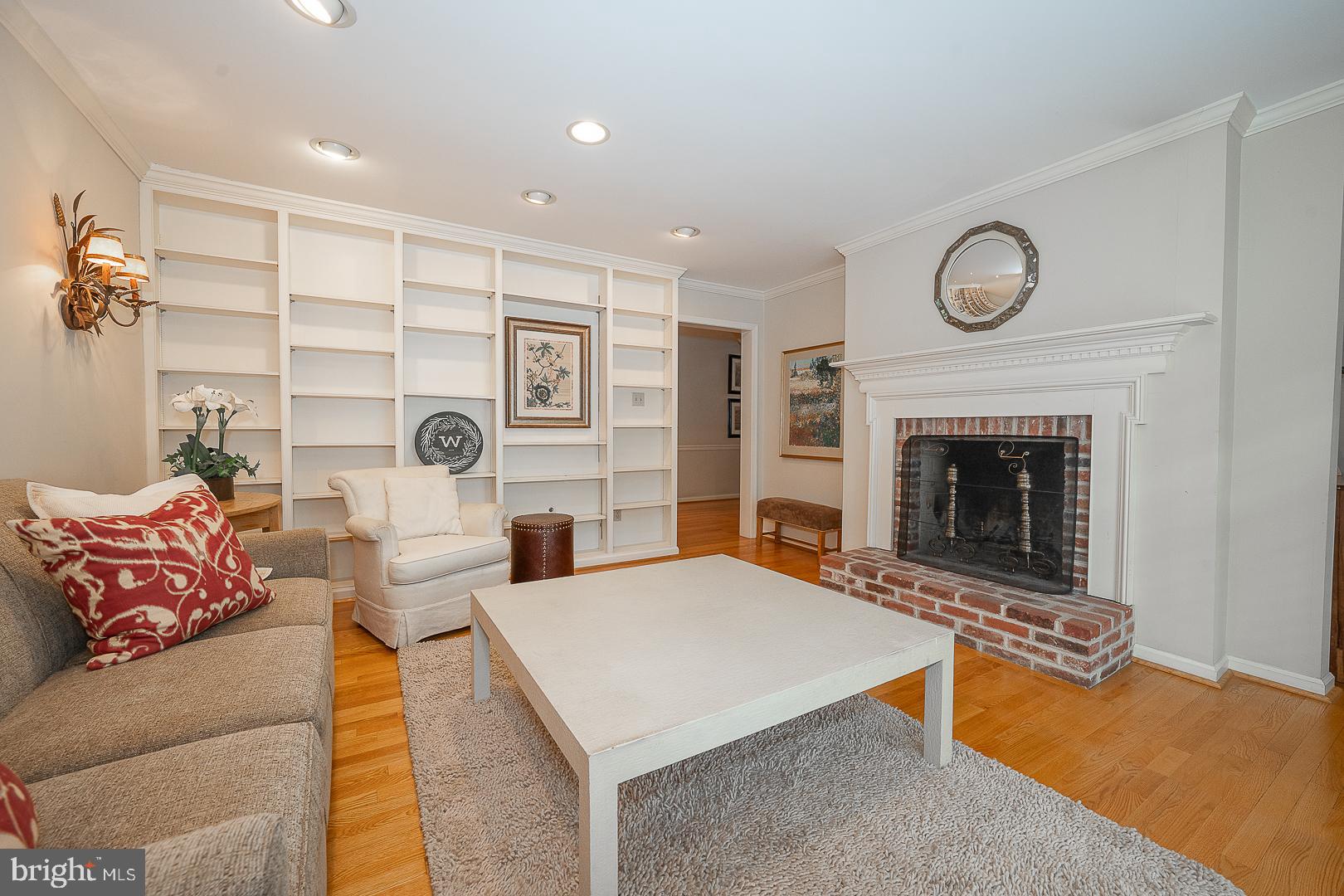 431 Waynesbrooke Road Berwyn, PA 19312 - Photo 13 of 63 a living room with furniture and a fireplace