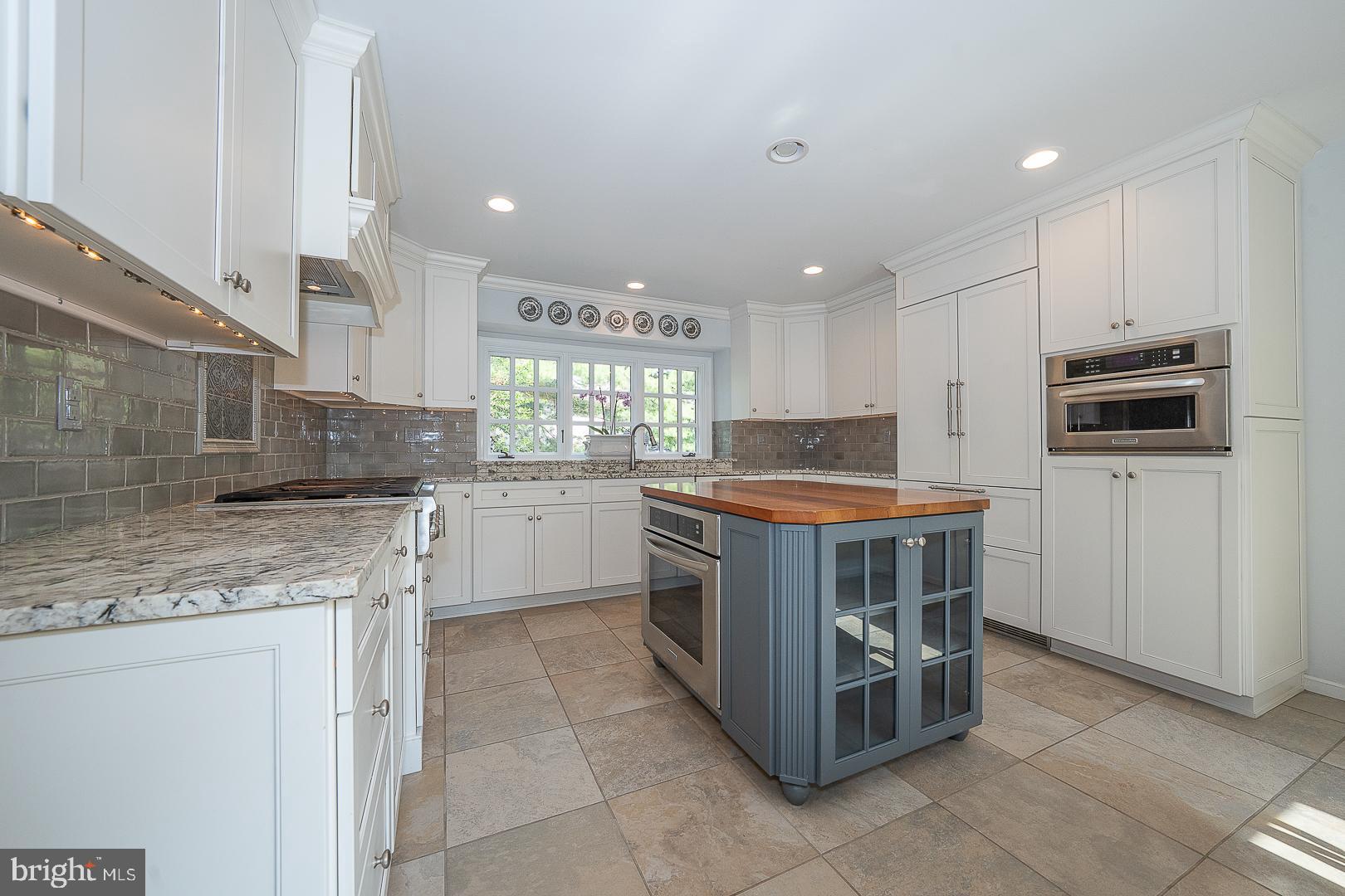 431 Waynesbrooke Road Berwyn, PA 19312 - Photo 17 of 63 a kitchen with a stove microwave and cabinets