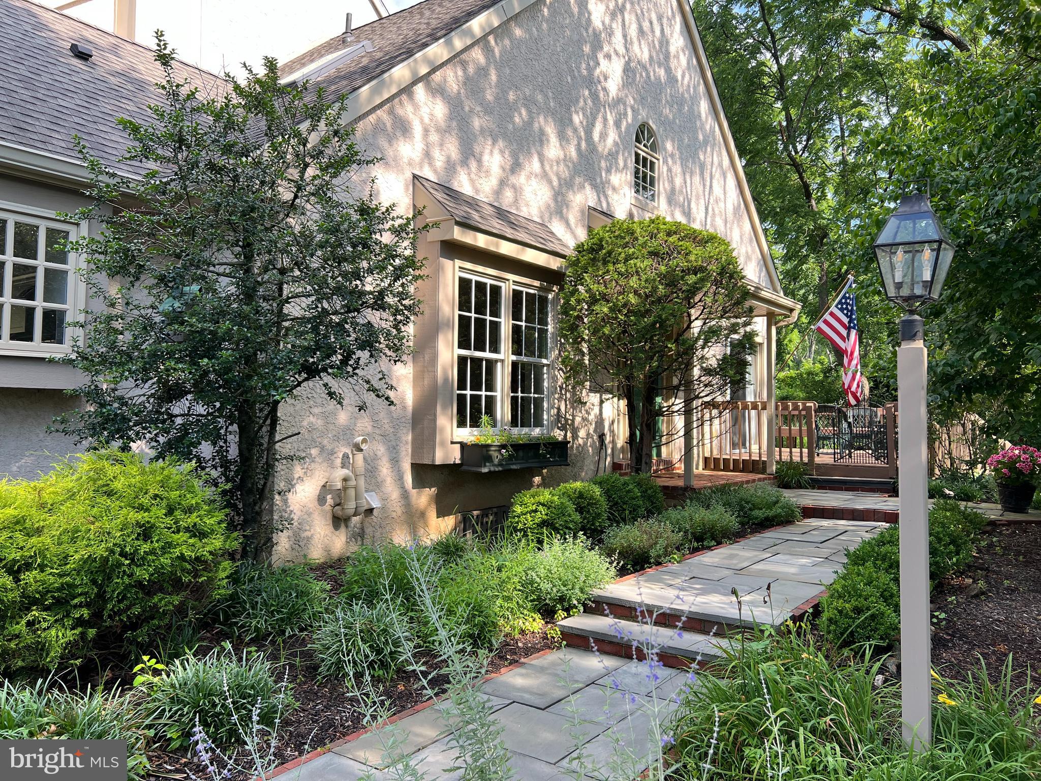 431 Waynesbrooke Road Berwyn, PA 19312 - Photo 2 of 63 a front view of a house with garden