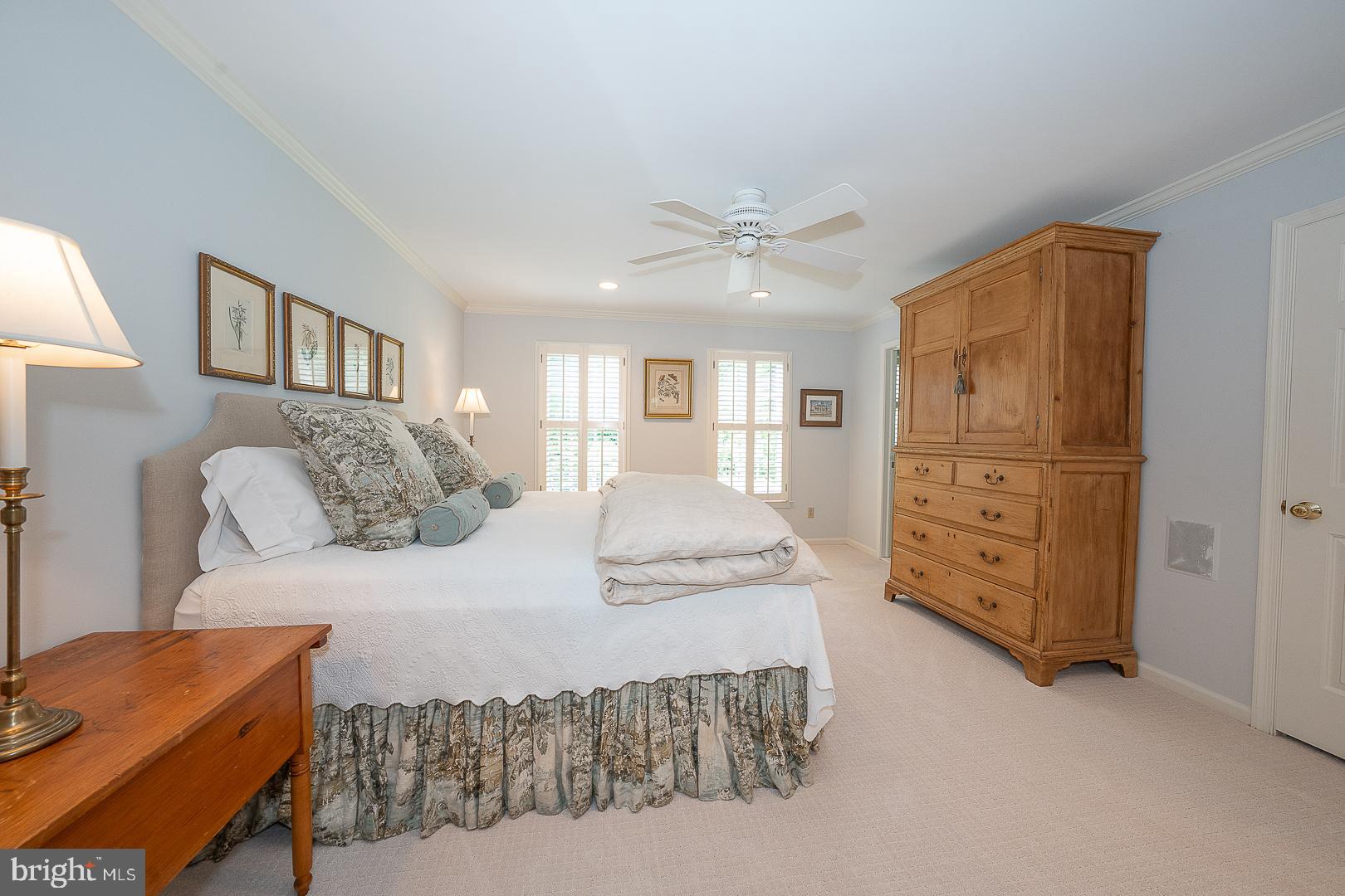 431 Waynesbrooke Road Berwyn, PA 19312 - Photo 26 of 63 a spacious bedroom with a bed a dresser and a lamp