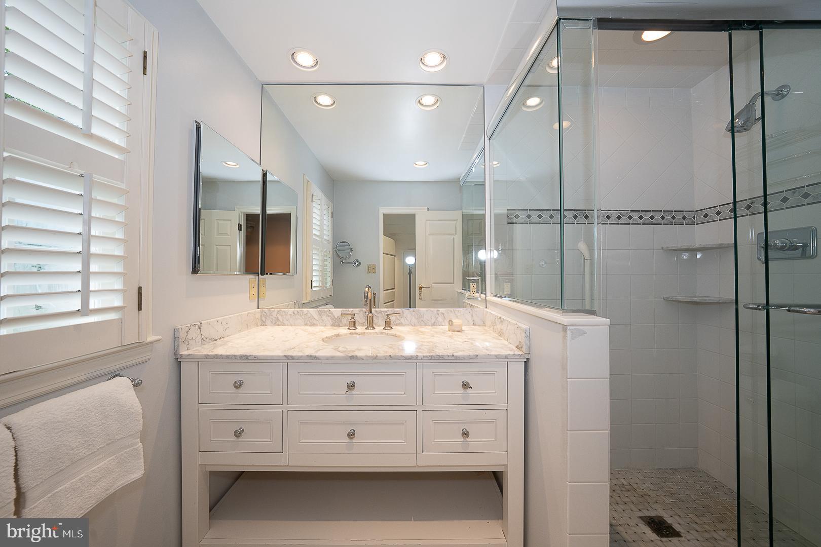 431 Waynesbrooke Road Berwyn, PA 19312 - Photo 27 of 63 a bathroom with a granite countertop sink mirror and double