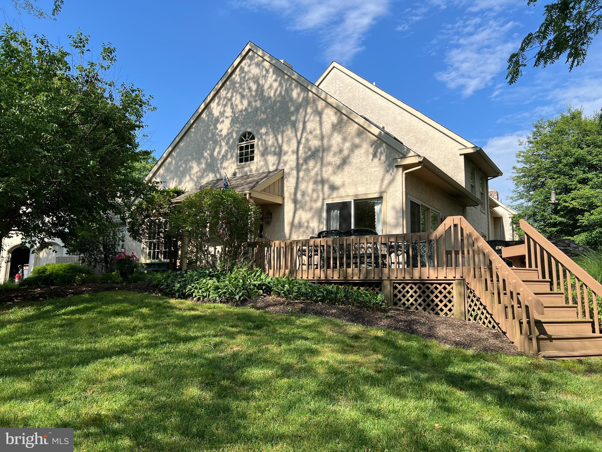 431 Waynesbrooke Road Berwyn, PA 19312 - Photo 3 of 63 a view of a house with a yard and a garden