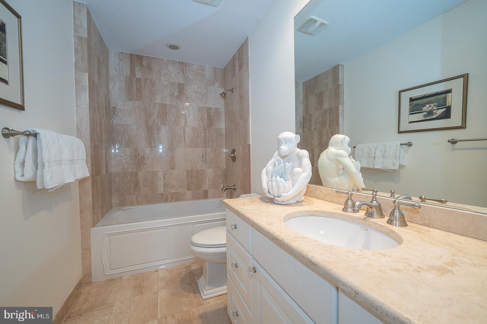 431 Waynesbrooke Road Berwyn, PA 19312 - Photo 38 of 63 a bathroom with a granite countertop sink a toilet and bathtub