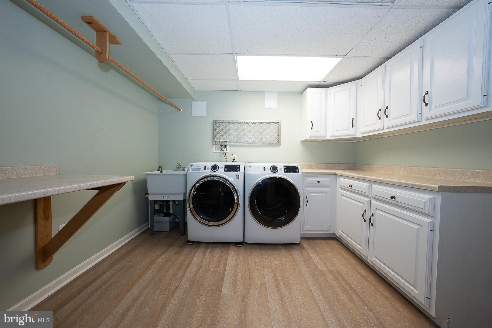 431 Waynesbrooke Road Berwyn, PA 19312 - Photo 45 of 63 a utility room with sink dryer and washer