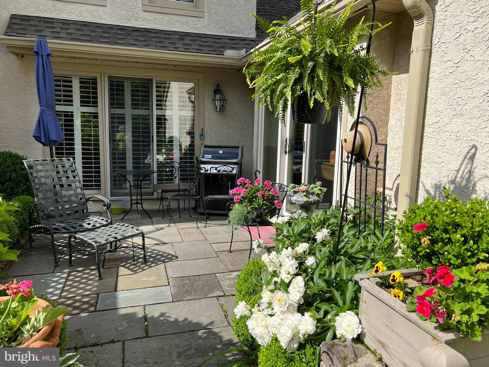 431 Waynesbrooke Road Berwyn, PA 19312 - Photo 52 of 63 a potted plant sitting in front of a house