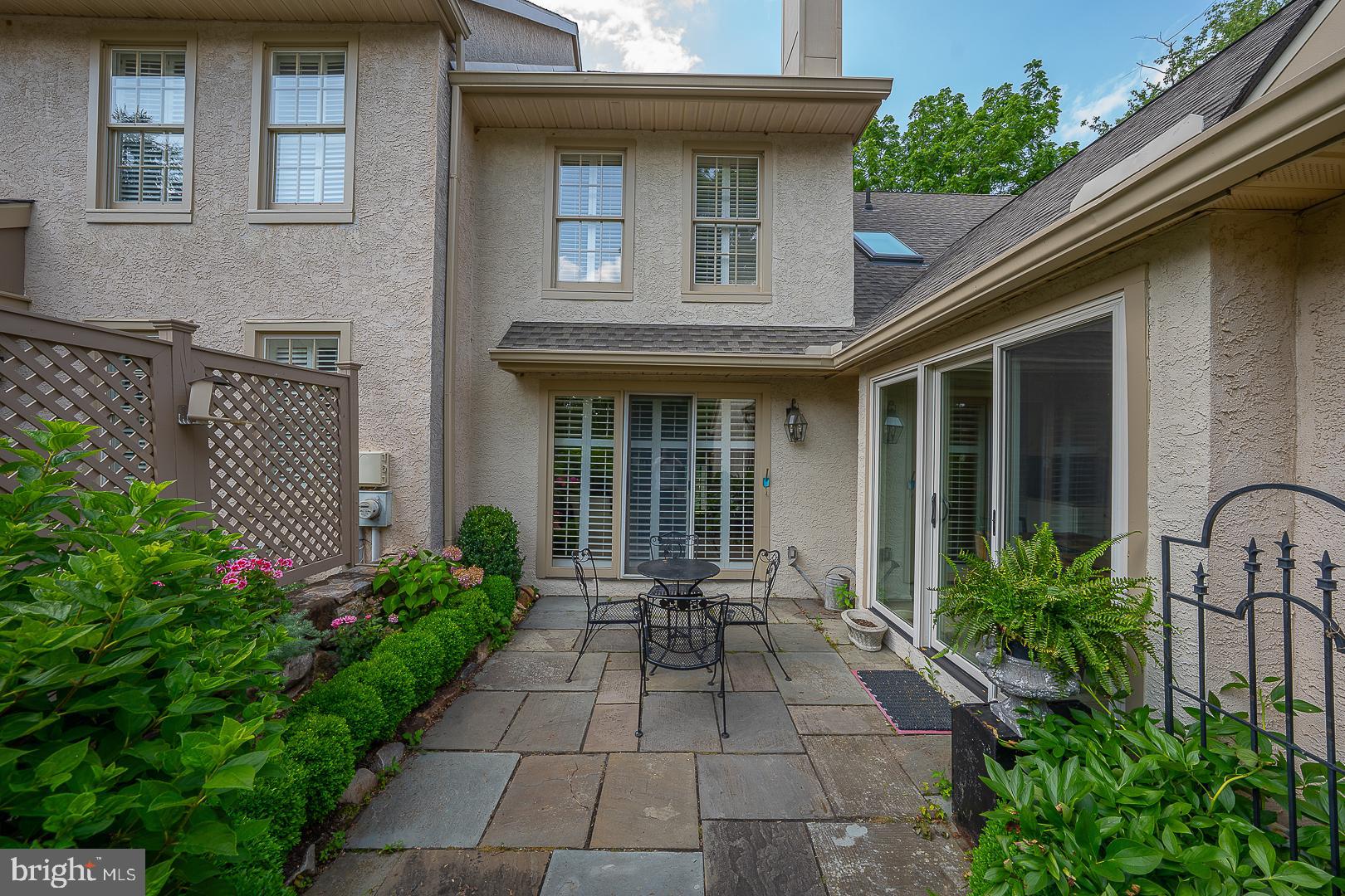 431 Waynesbrooke Road Berwyn, PA 19312 - Photo 54 of 63 a view of house with patio outdoor seating and plants