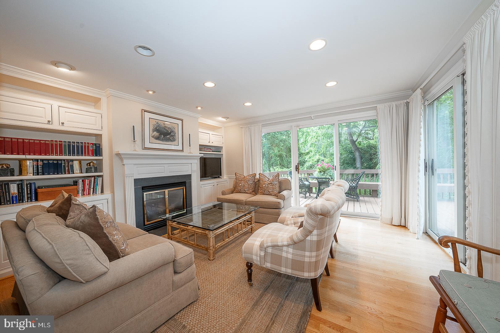 431 Waynesbrooke Road Berwyn, PA 19312 - Photo 7 of 63 a living room with furniture fireplace and a large window