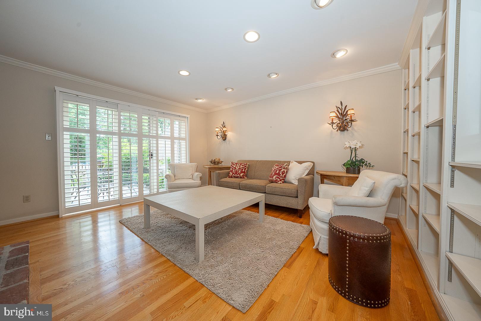 431 Waynesbrooke Road Berwyn, PA 19312 - Photo 10 of 63 a living room with furniture large window and wooden floor