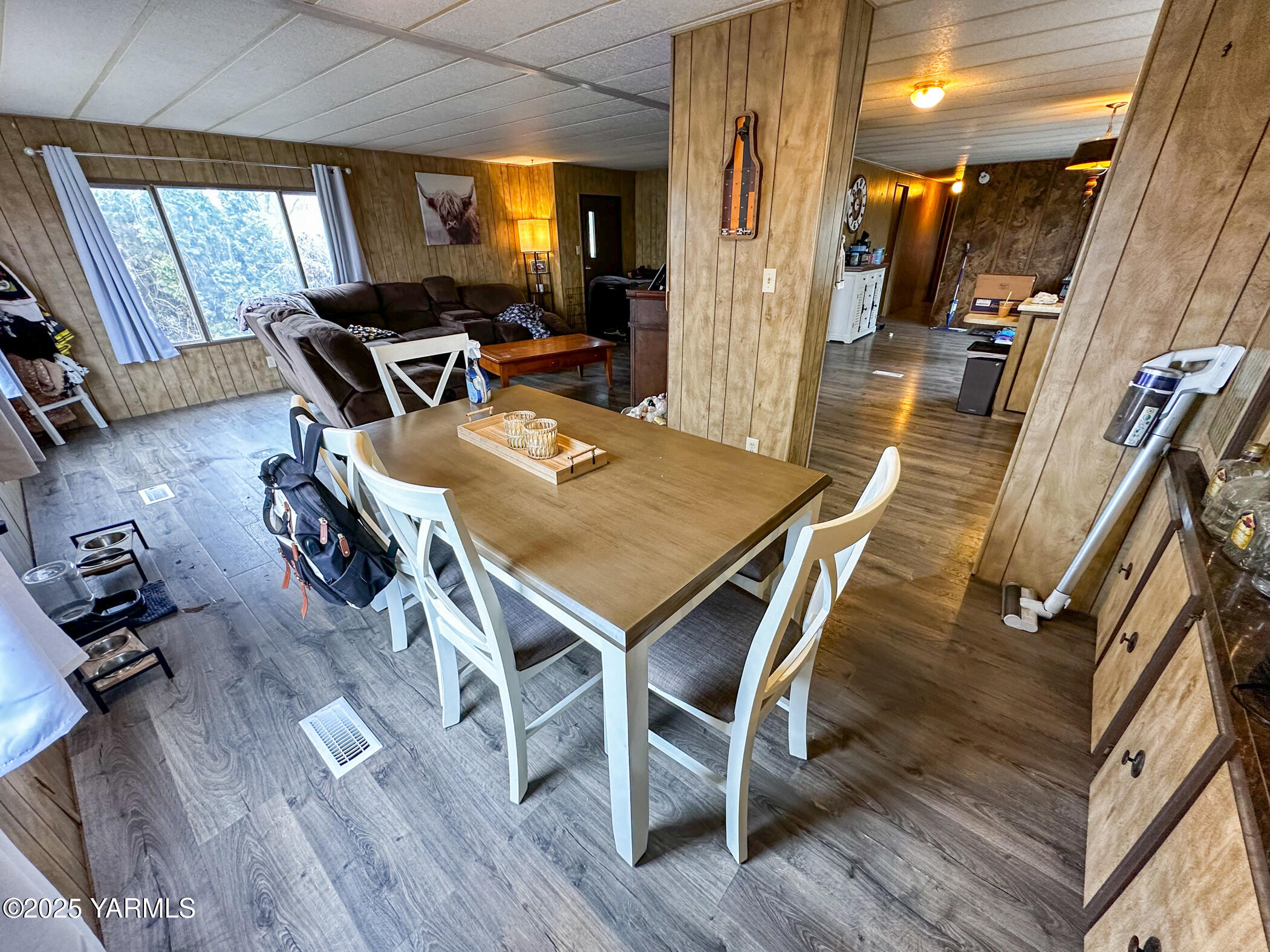 10 Wiland Heights Road Selah, WA 98942 - Photo 6 of 16 a view of a dining room with furniture window and wooden floor