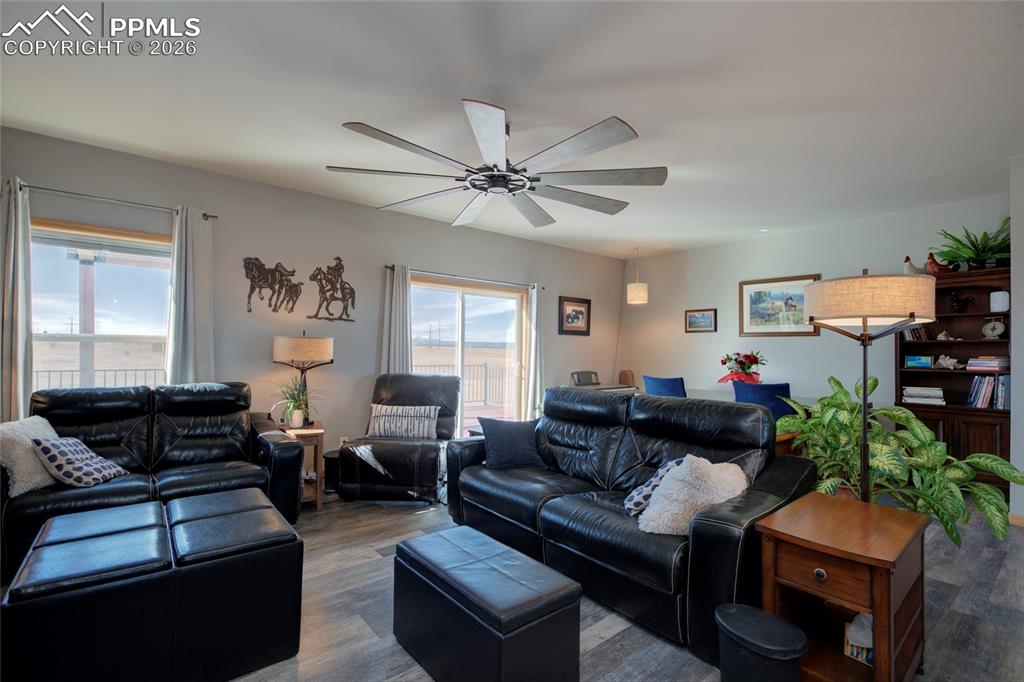 24965 Cave Spg Trail Elbert, CO 80106 - Photo 21 of 50 a living room with furniture and a window